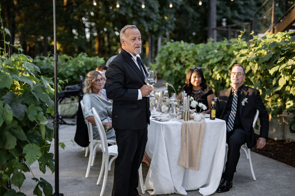 Father of bride emotional speech at winery summer elopement reception at the Domaine de Broglie in Dayton, Oregon