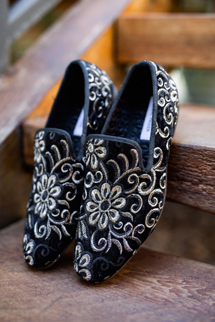 Detail shot of groom's embroidered loafers at Domaine de Broglie winery summer elopement in Dayton, Oregon