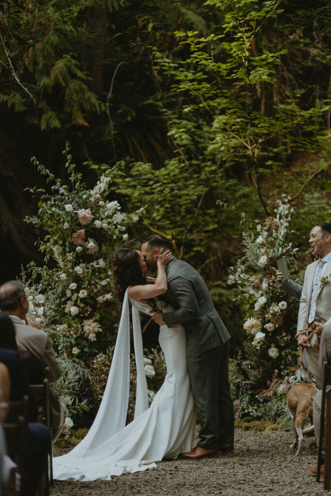luxury forest wedding ceremony kiss