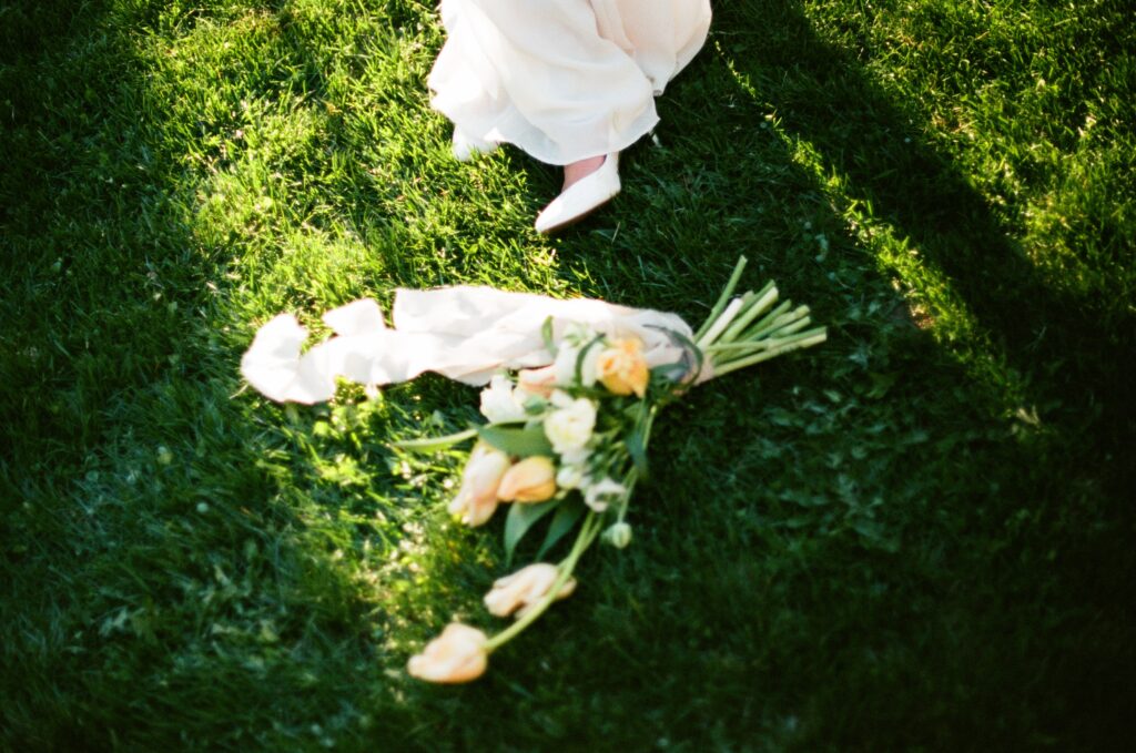 mt. hood organic farms sunset photo of bouquet and wedding shoes