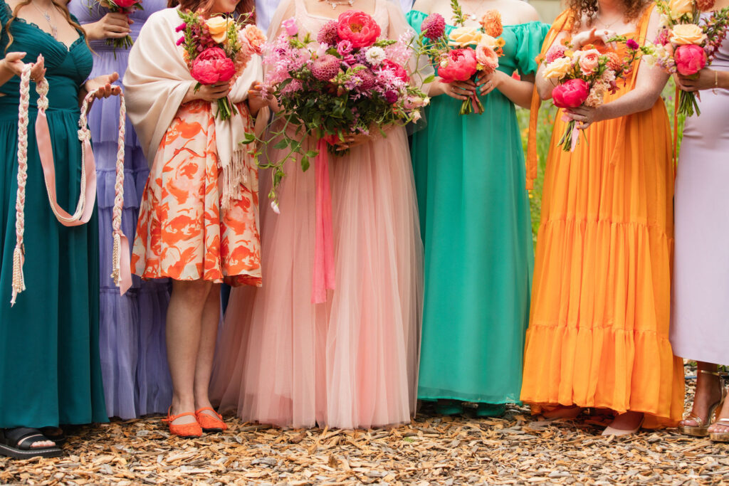 Colorful bridal party photo at Pebble Cove Farm