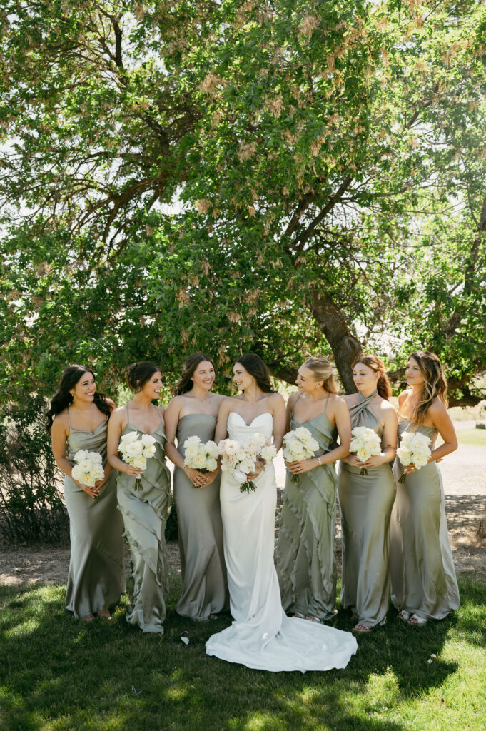 bride with bridesmaids before Brasada Ranch wedding