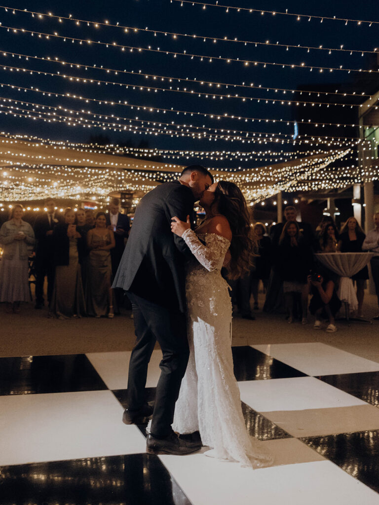 Romantic first dance on custom dance floor at Callaway Vineyard & Winery wedding reception