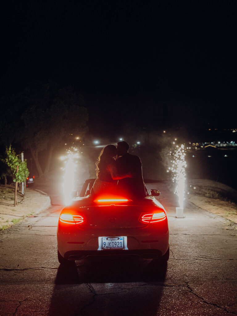 Callaway Vineyard & Winery wedding reception exit with sparklers and a convertible