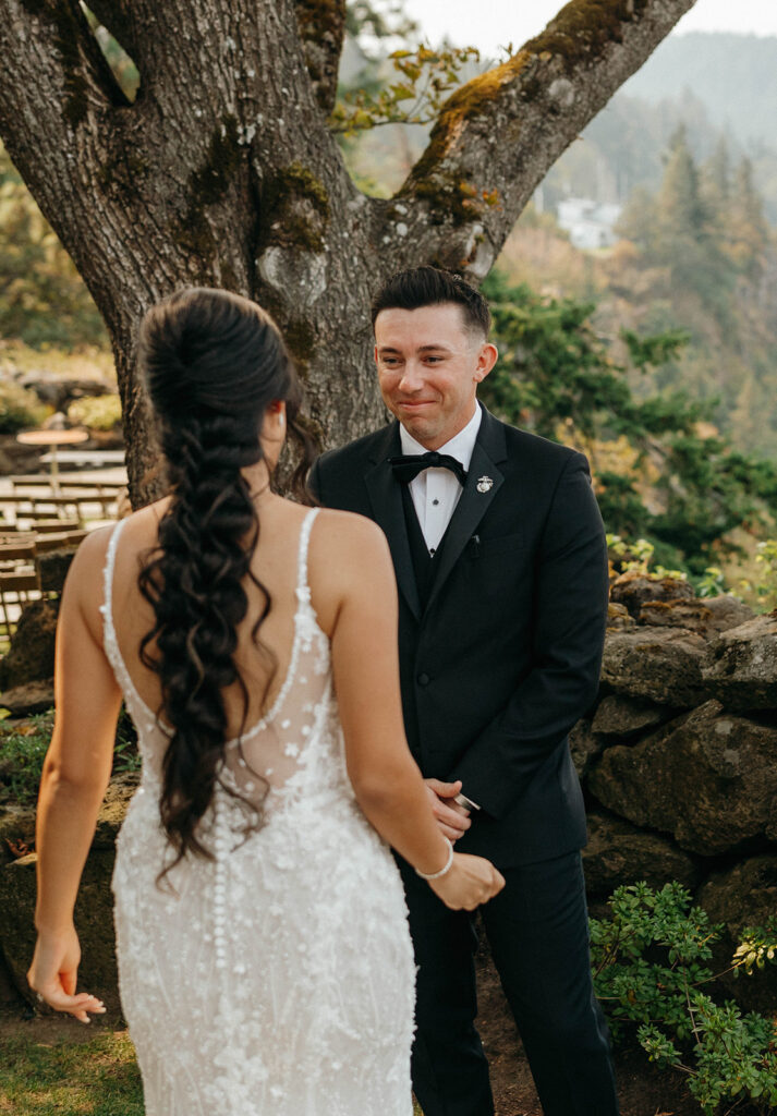 Groom's emotional reaction seeing bride during first look