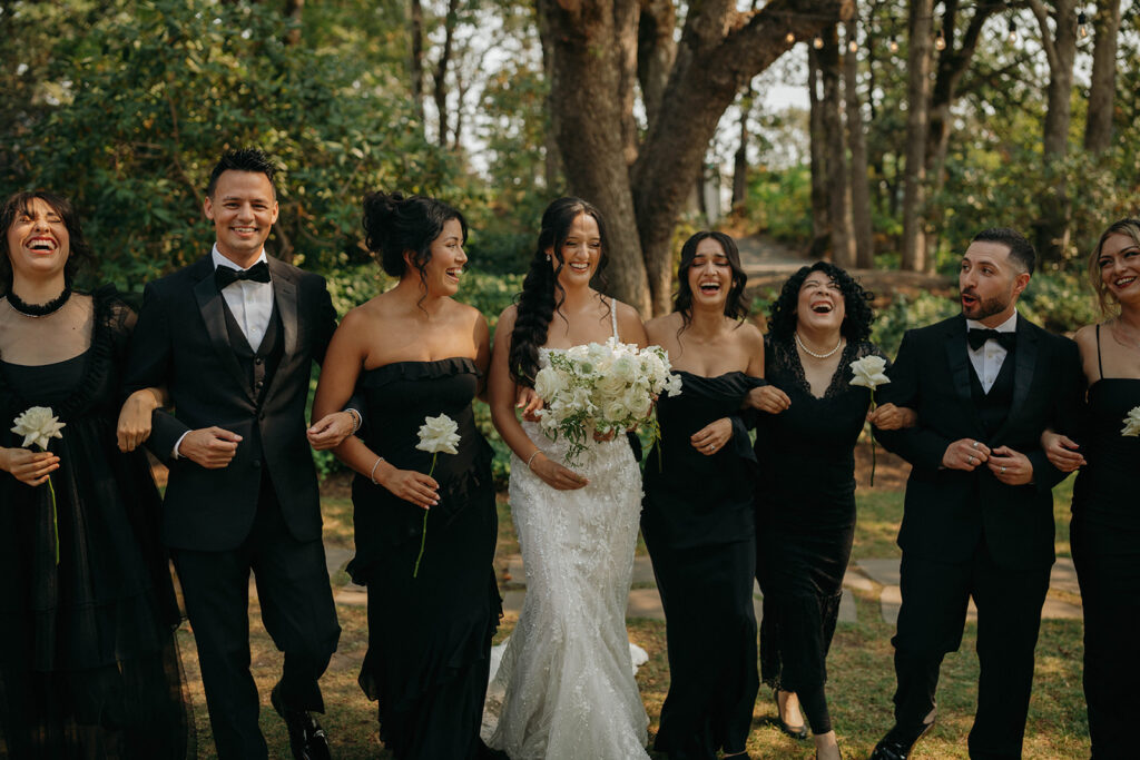 Bride walking arm-in-arm with Hood River wedding party