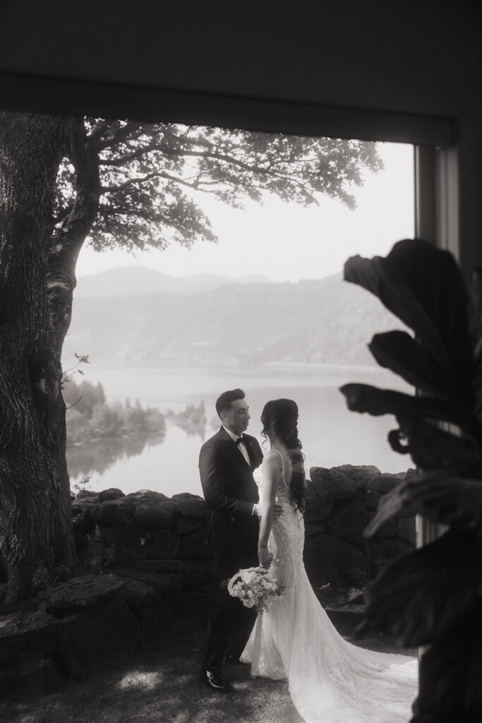 Romantic black and white shot of bride and groom in Hood River, OR