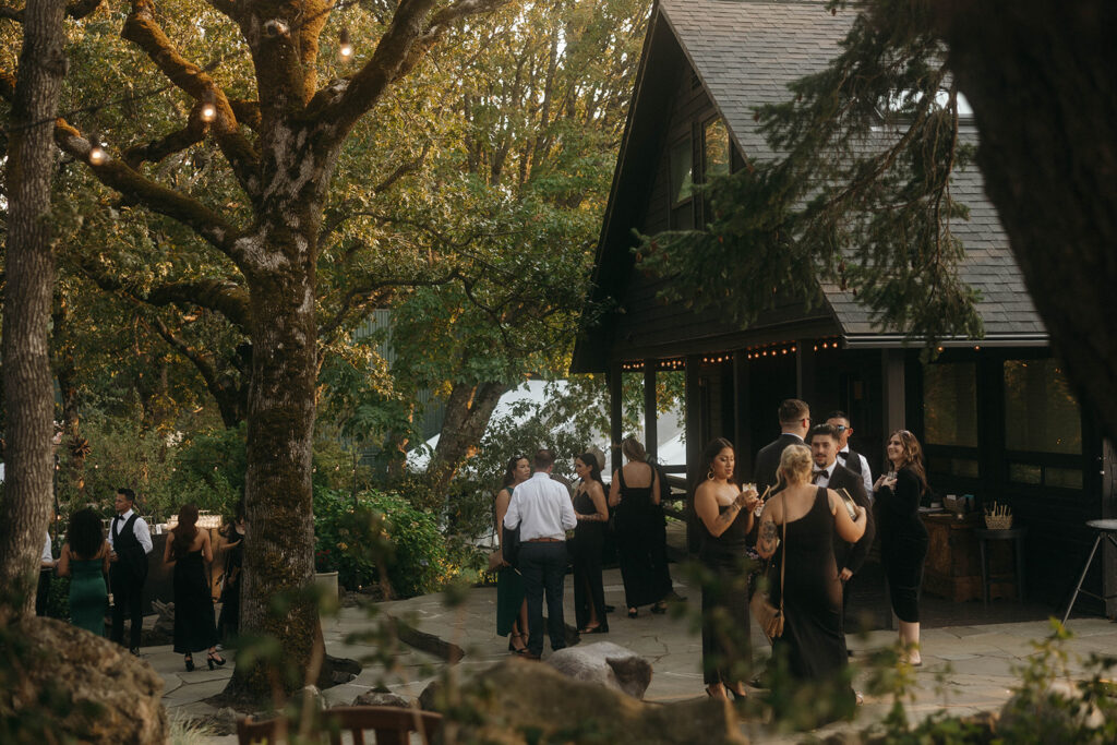 Guests mingling during romantic Griffin House wedding cocktail hour