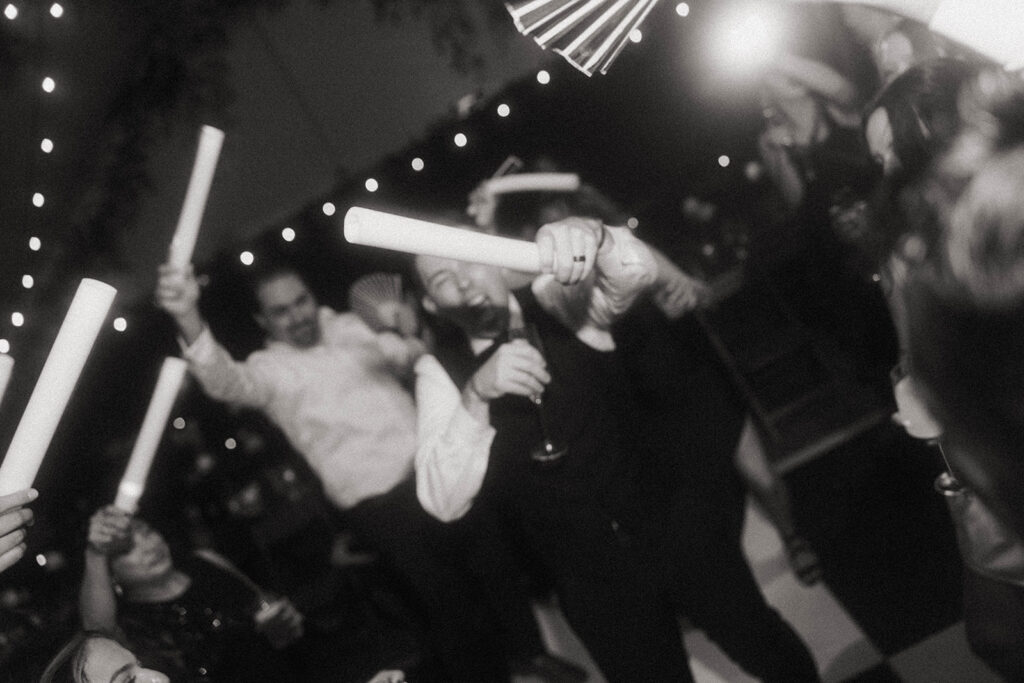 Blurry shot of guests dancing at romantic Griffin House wedding