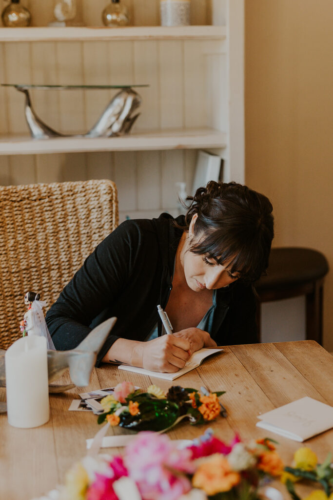 Bride finishes vows while getting ready for redwoods California wedding