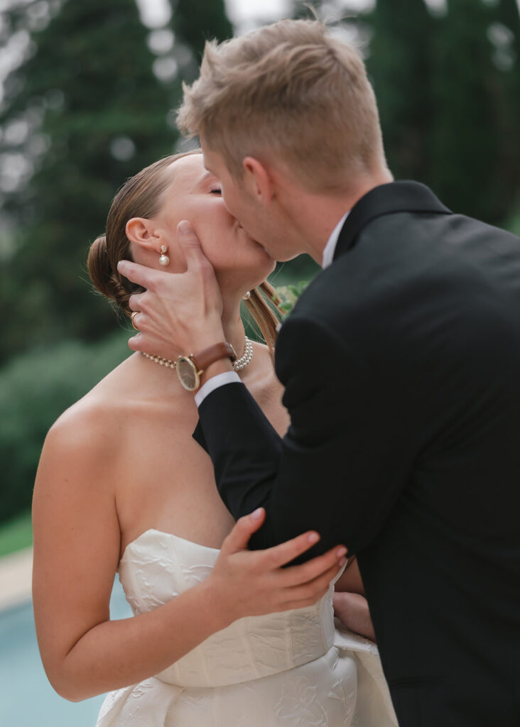 Romantic kiss after Villa Rinaldi wedding