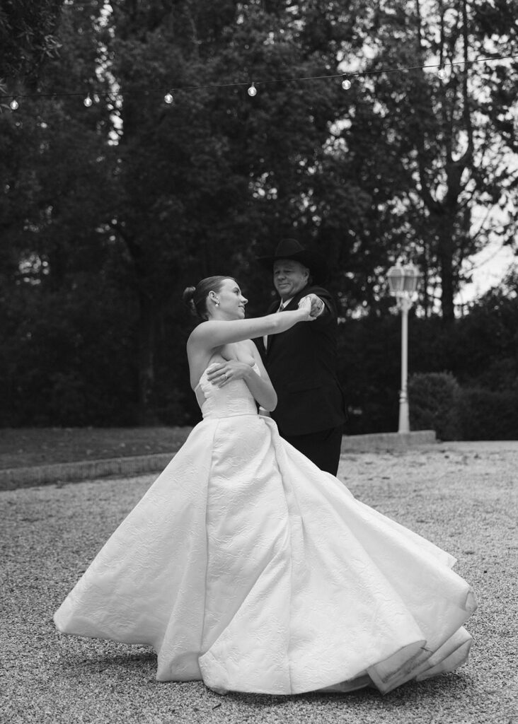 Bride dancing with her father during Villa Rinaldi wedding reception