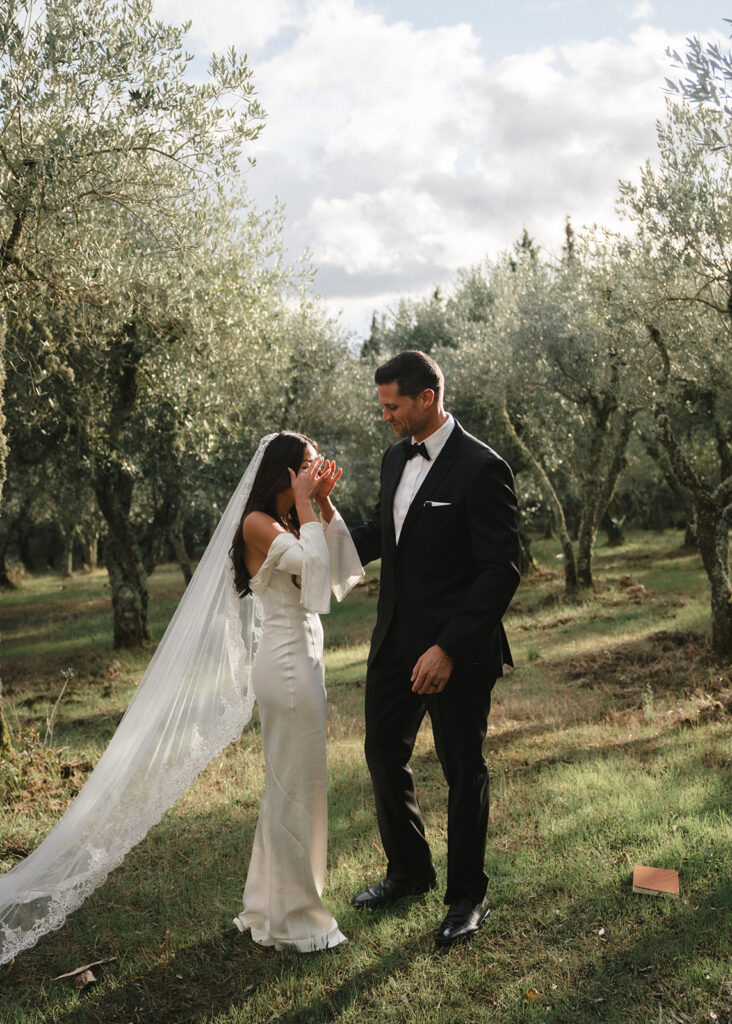 Intimate moment between bride and groom during il villino wedding ceremony