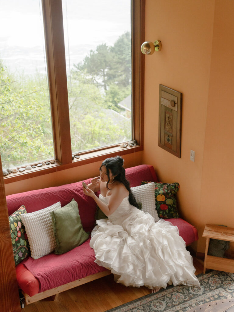 bride getting ready in cool airbnb