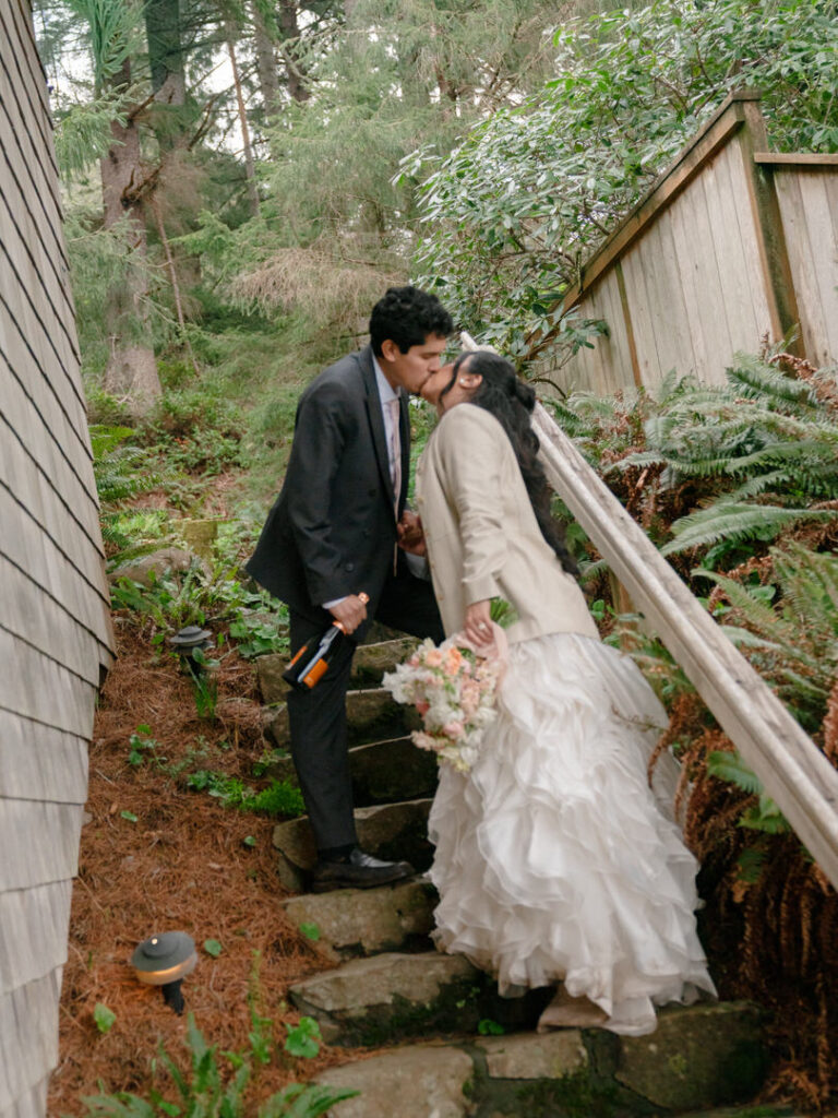 bride and groom in forest on stairs