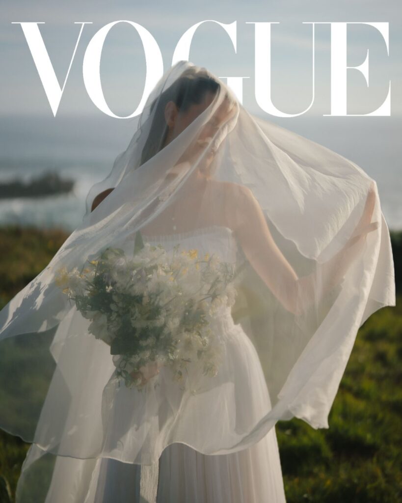 Bride under her veil holding bouquet in a Vogue-featured image from Sea Ranch Lodge wedding